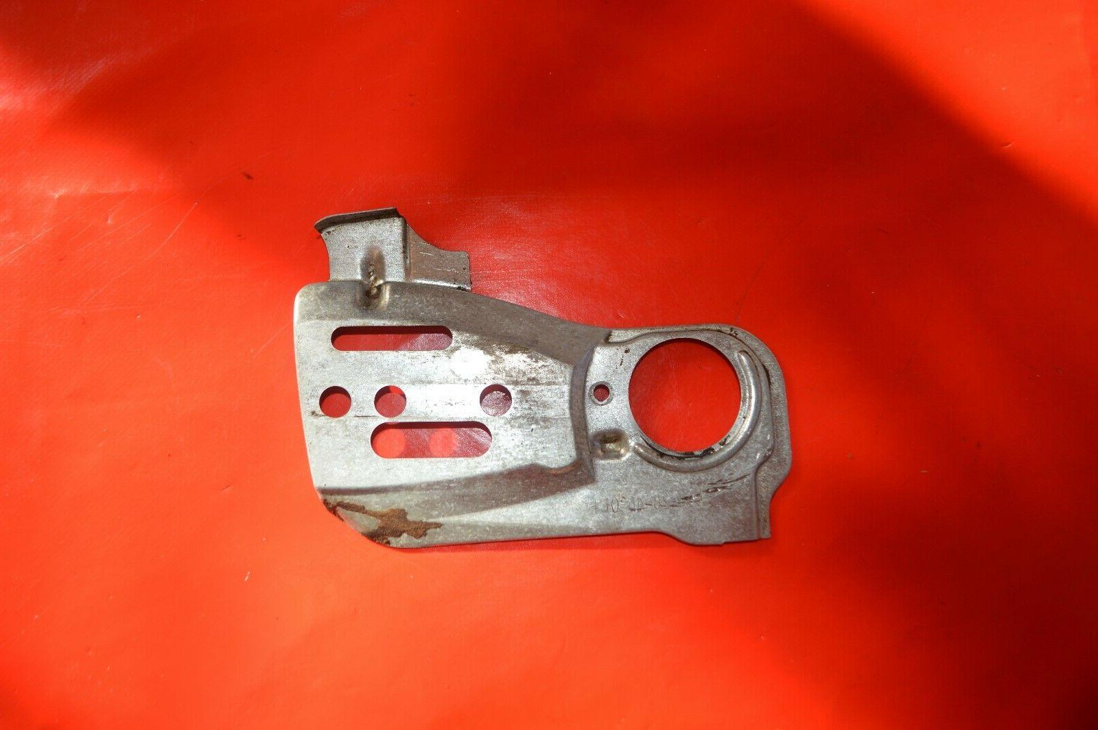 plaque laterale tronconneuse 135